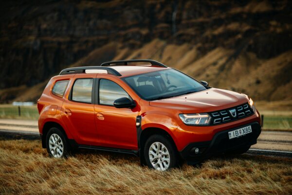 Red Dacia Duster Left on the Roadside